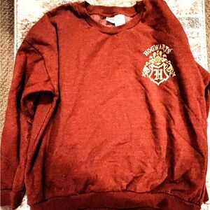 Warner Bros. Hogwarts Crewneck Sweatshirt in Maroon with Gold Crest